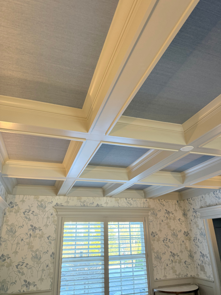 Coffered ceiling detail in New Canaan, CT with soft blue inset panels, crisp white trim, and refined interior millwork