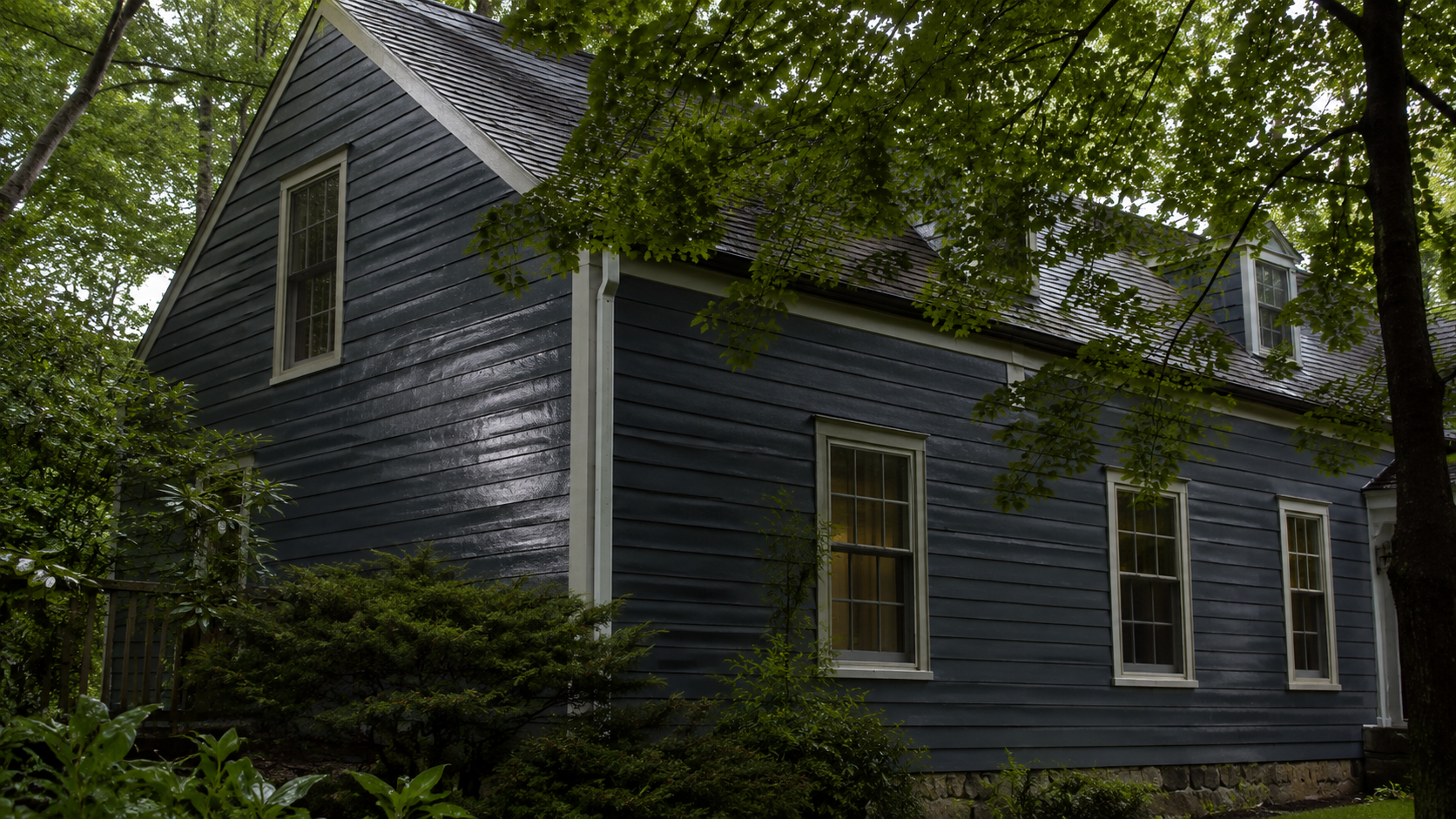 Tree Canopy and Shade Affecting Exterior Paint in New Canaan CT Tree canopy keeping exterior siding damp on a shaded New Canaan CT home